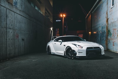 white Nissan GTR Skyline coupe
